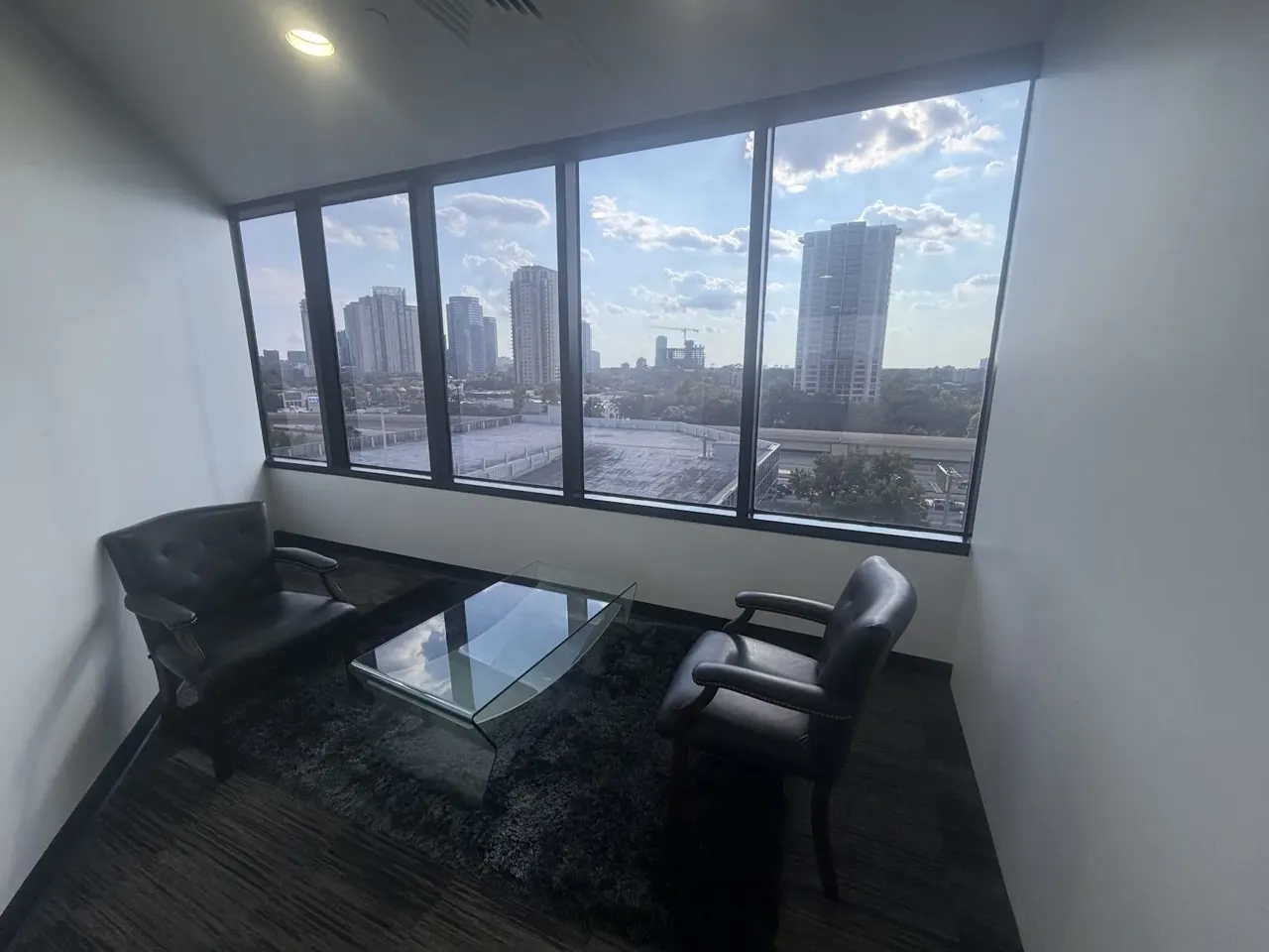 Window lounge on the seventh floor at 1001 West Loop South, looking toward Uptown Houston